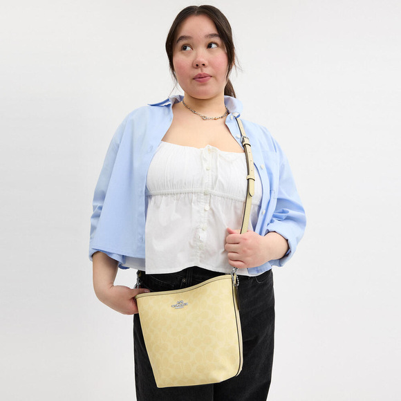 City Bucket Bag In Signature Canvas - Picture 2 of 5